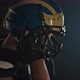 Portrait of American Football Sportsman Player Putting on and Tightening His Football Helmet on - VideoHive Item for Sale