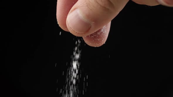 Chef adds salt to the dish, cooking in slow motion, cooking food