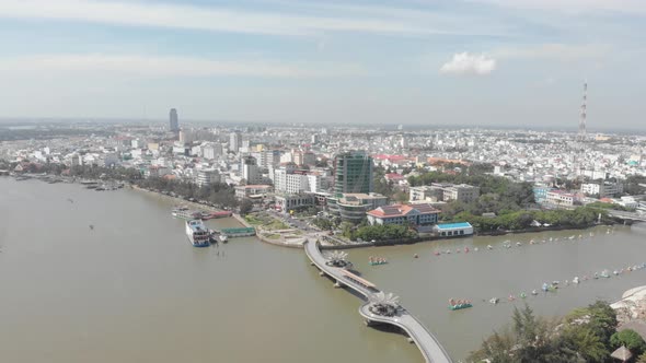 Aerial: Can Tho city skyline bridges over Mekong River, Vietnam