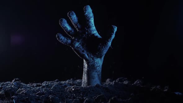 Zombie Hand Rising Out From the Ground