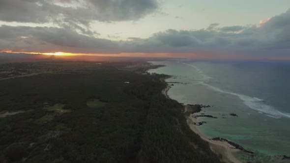 Flying along the coastline of Mauritius at sunset