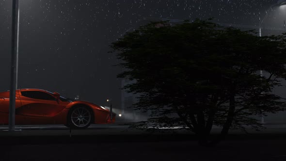 Red Car in the Dark in the Rain