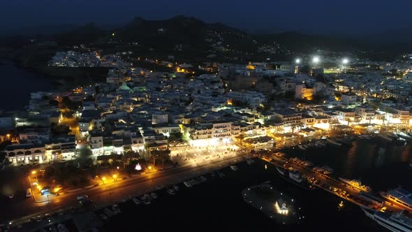 Port of the island of Naxos in the Cyclades in Greece aerial night view