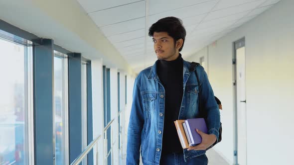 Indian Student with a Books in the University or College