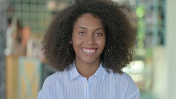 Smiling African Woman Looking at Camera 