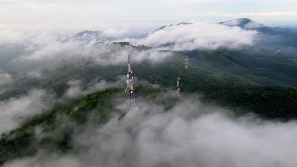 Aerial view telecommunication tower at the peak