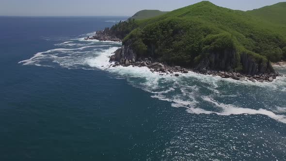 View From a Droneon a Stone Cape Washed By Strong Waves