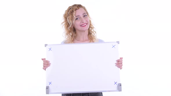Happy Beautiful Blonde Woman Holding White Board