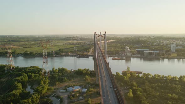 Pan left of Zarate Brazo Largo road and railway complex cable stayed bridge crossing Parana river an