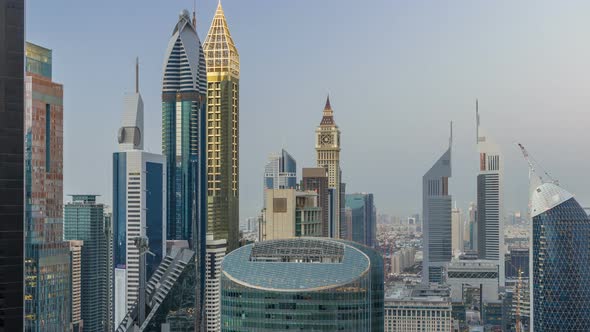 Skyline View of the Buildings of Sheikh Zayed Road and DIFC Day to Night Timelapse in Dubai UAE