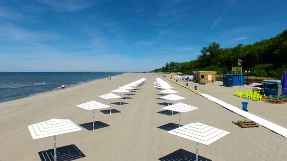 Aerial view of the beach umbrellas in summer