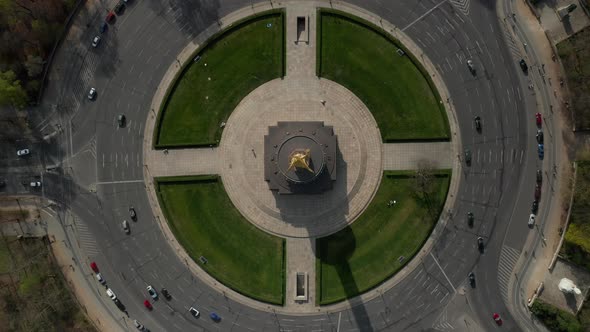 AERIAL: Overhead Birds Eye Drone View of Berlin Victory Column Roundabout with Little Car Traffic