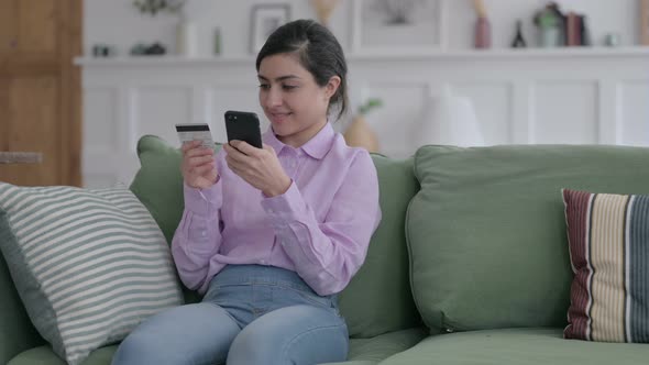 Indian Woman making Online Payment on Smartphone