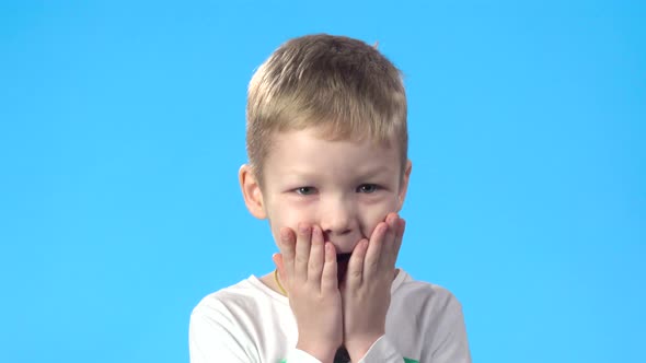 Child Looking Overjoyed with Something, Smiling and Nodding His Head