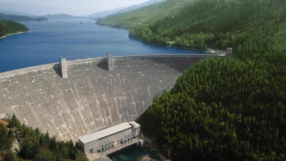 Aerial drone shot of the river, dam and reservoir (Hungry Horse Dam, Flathead River, Montana, USA)