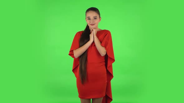 Pretty Young Woman Is Looking with Tenderness. Green Screen