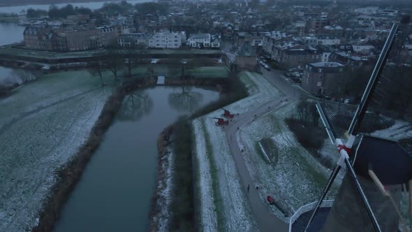 Nooit Volmaakt - Linge River With Historic Mill In Gorinchem During Winter Season In South Holland,