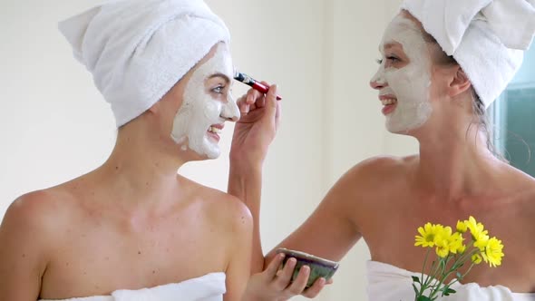 Beautiful Woman Having a Facial Treatment at Spa