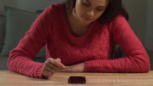 Caucasian woman using her phone