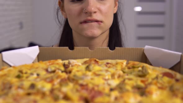 Hungry Dieting Woman Can't Eat Tasty Pizza