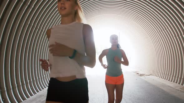 Young Women or Female Friends Running Outdoors