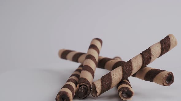 Chocolate Wafer Sticks or Rolls on a White Background