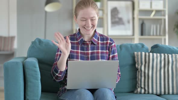 Young Woman Video Calling on Laptop