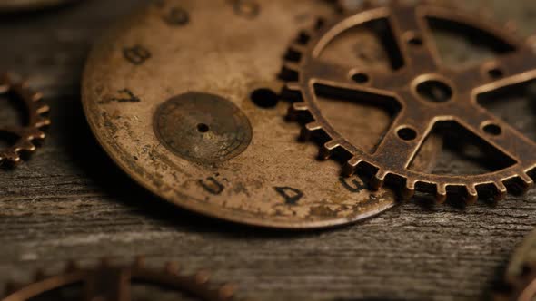 Rotating stock footage shot of antique and weathered watch faces - WATCH FACES