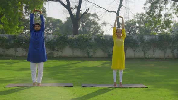 Indian couple doing exercise