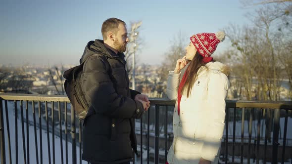 Happy Romantic Couple on a Date at Sunny Winter Day