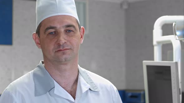 Male Doctor Is Looking at Camera While Standing