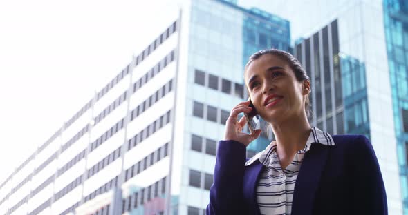 Businesswoman talking on mobile phone