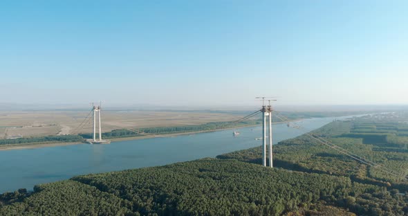 Twin Towers Of The Braila-Tulcea Bridge Now Connected With Suspension Cable Over Danube