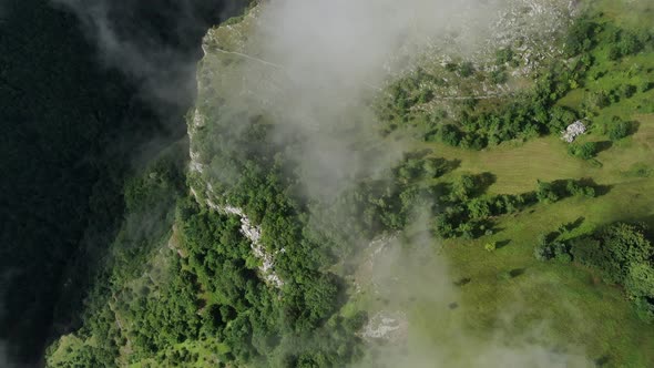 Aerial Flight Through the Clouds and Fog