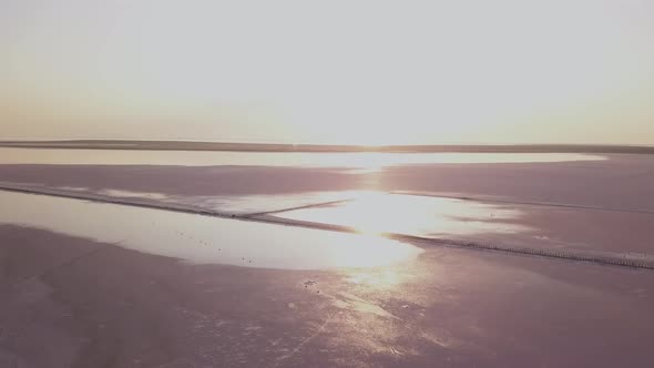 Beach with Pink Salt Shot From Above in the Evening on the Sunset. Aerial View