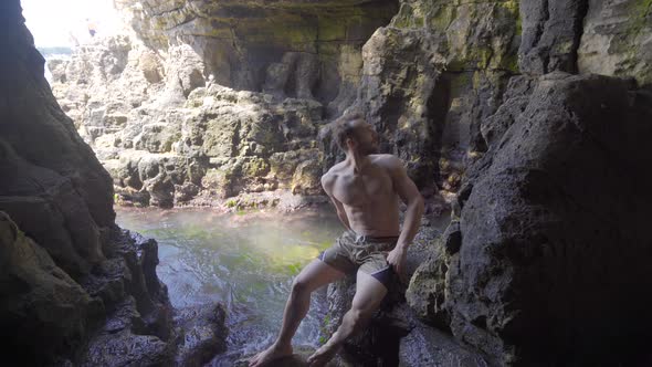 Young man on the tropical beach.