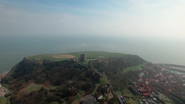 Massive Promontory With Scarborough Castle Overlooking The North Sea and Scarborough, North Yorkshir