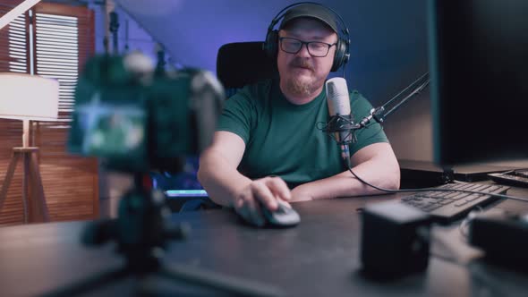 Adult Man In Glasses With Borodai Leads A Live Stream