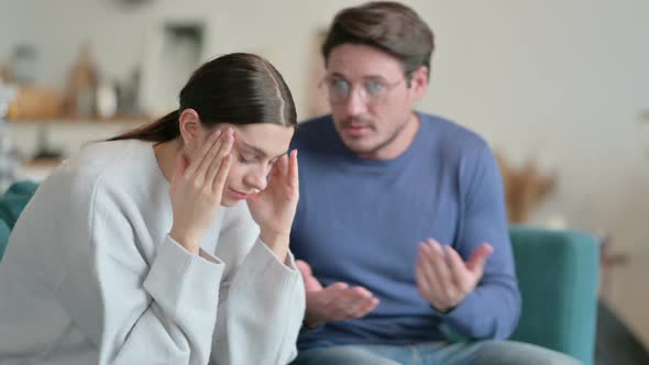 Hispanic Man Fighting with Stressed Female Partner