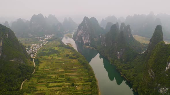 Aerial shot of the amazing rock formations along the Li River in China