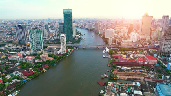 4K UHD : Bangkok River drone view. Flying over the Chao Phraya River