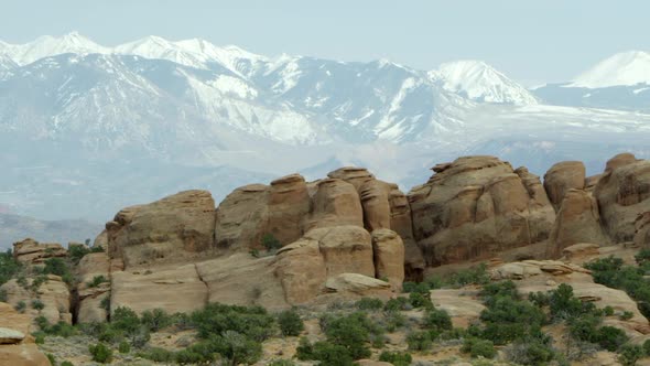 Sandstone layers with the La Sal Mountains