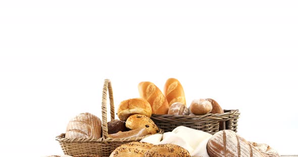 Various types of bread in wicker basket