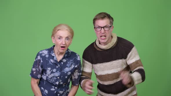 Happy Grandmother and Grandson Looking Excited Together