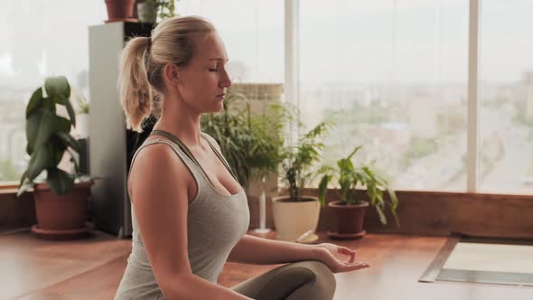 Woman Meditating Alone