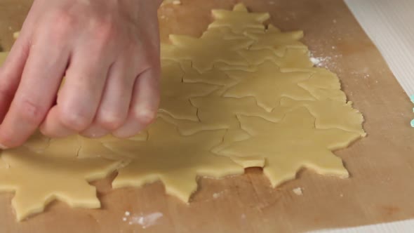 Woman Works With Snowflake Cookie Dough. Cooking Marshmallow Sandwiches. Close Up Shot