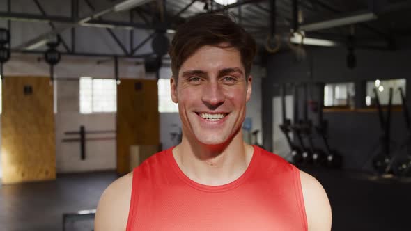 Portrait athletic Caucasian man smiling at the camera