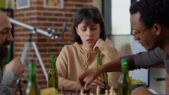 Portrait of Caucasian Woman Playing Board Games with Friends