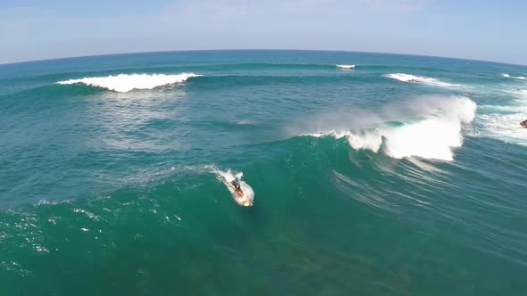 Aerial view of a wipeout sup stand-up paddleboard surfing in Hawaii