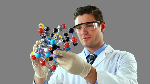 Scientist experimenting molecule structure